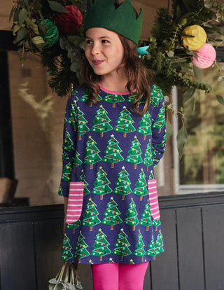 Mini Boden Girl's Printed Jersey Pocket Tunic in Starboard Blue Christmas Trees