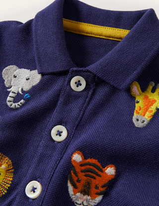 Baby Boden Fun Pique Polo Shirt in Starboard Jungle Animals