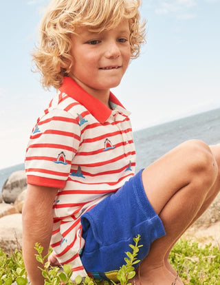 Mini Boden Boy's Embroidered Polo Shirt in Red/Ivory Sharks